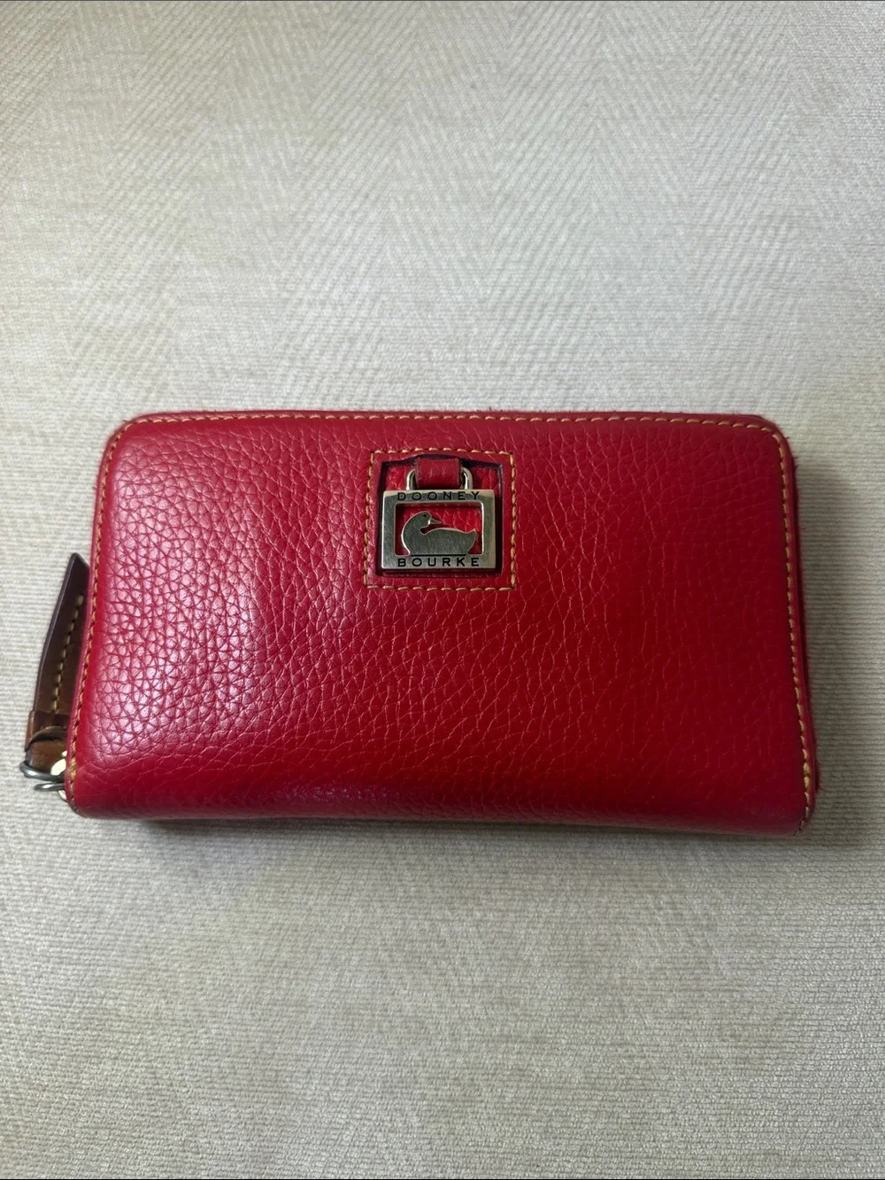 Dooney & Bourke Red Pebbled Leather Zip Wallet with Gold Plaque